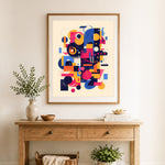 Finished geometric chaos cross stitch artwork displayed as home decor