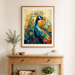 Finished geometric pop‑art peacock cross stitch artwork displayed as home decor