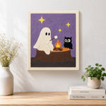 Finished ghost and owl toasting marshmallows artwork displayed on a wall