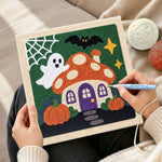 Creating handmade ghost at mushroom house punch needle artwork