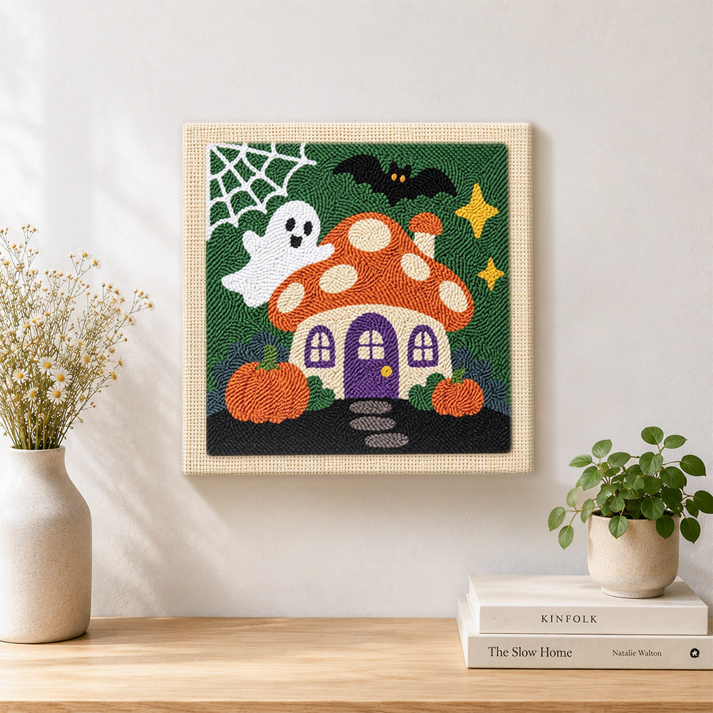 Finished ghost at mushroom house artwork displayed on a wall