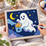 Creating handmade ghost collecting halloween candy punch needle artwork