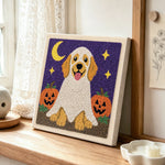 Ghost dog with pumpkins punch needle artwork displayed on a table
