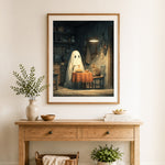 Finished ghost eating pasta with cat cross stitch artwork displayed as home decor