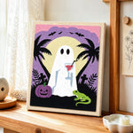 Ghost enjoying tropical night punch needle artwork displayed on a table