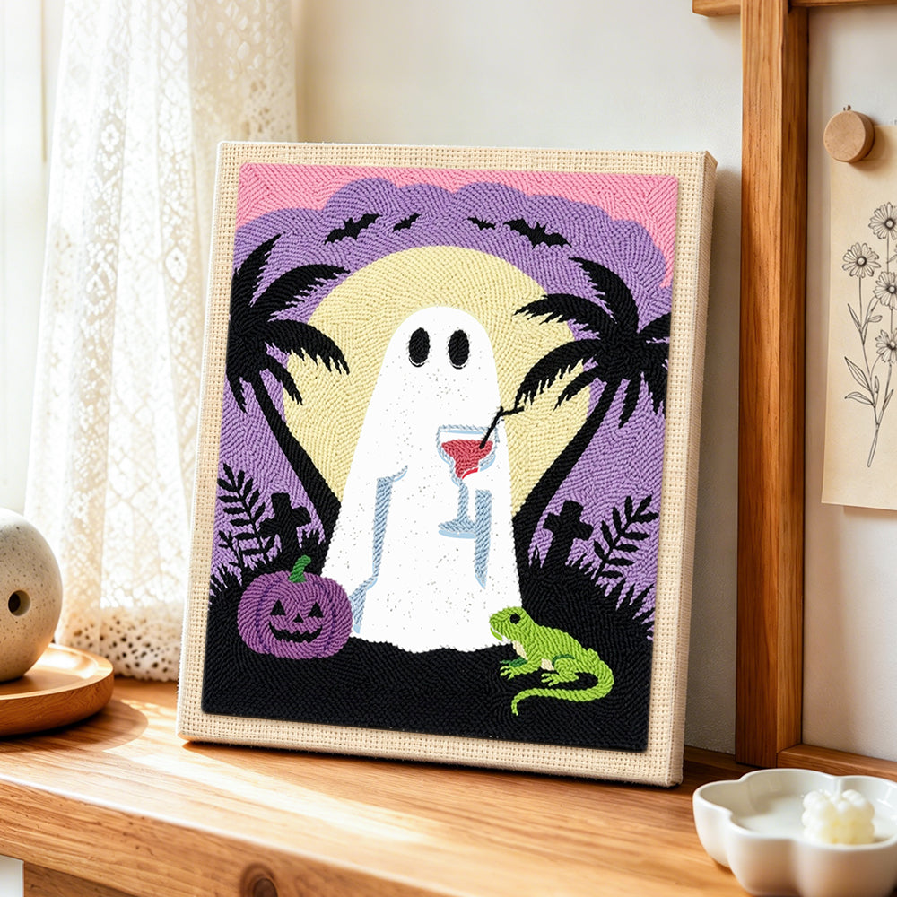 Ghost enjoying tropical night punch needle artwork displayed on a table