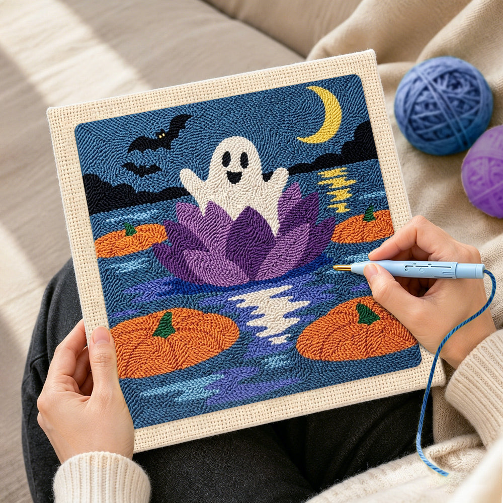 Creating handmade ghost floating on water lily punch needle artwork