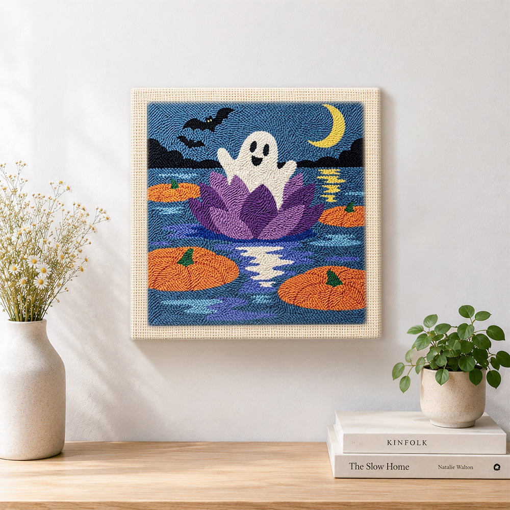 Finished ghost floating on water lily artwork displayed on a wall
