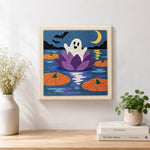 Finished ghost floating on water lily artwork displayed on a wall
