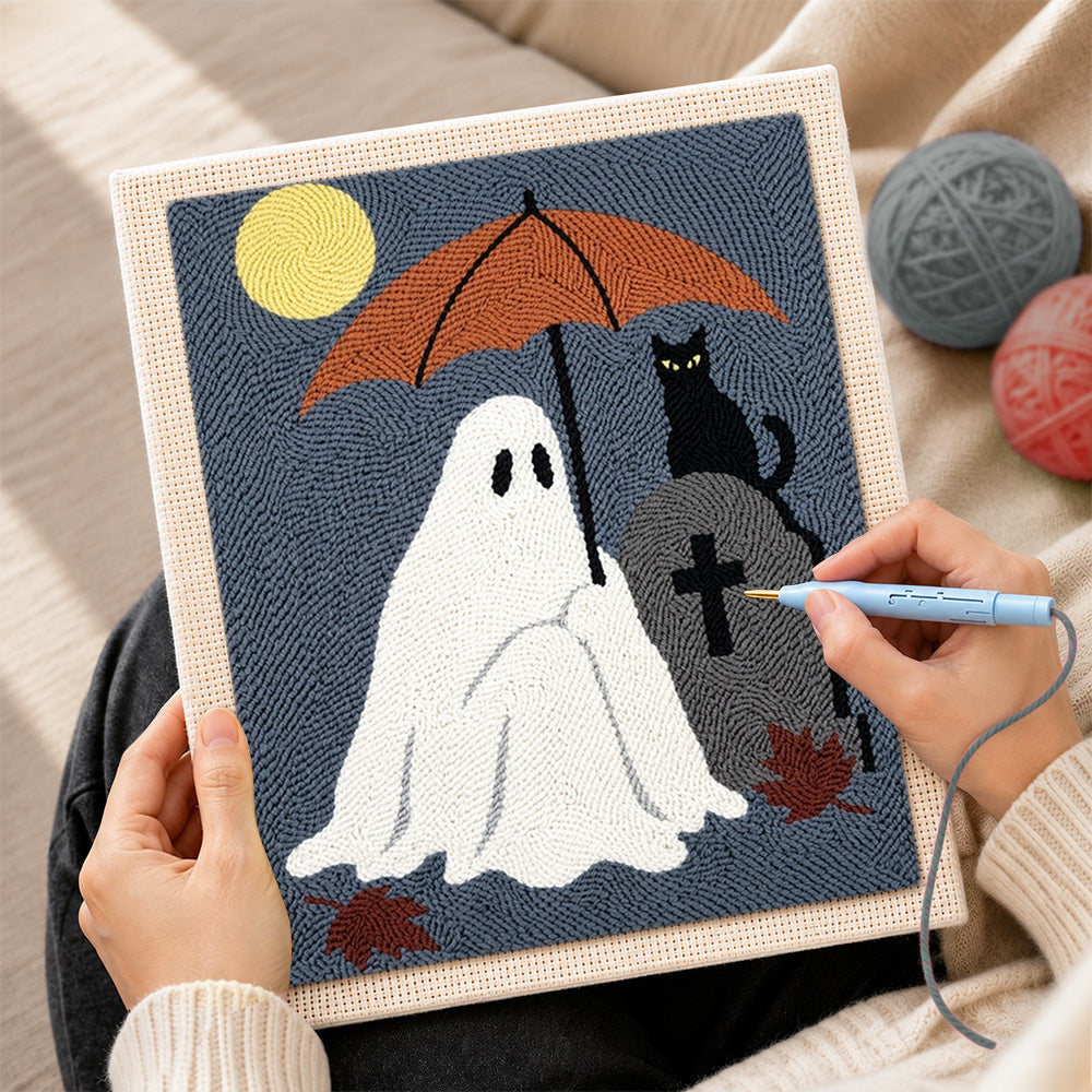 Creating handmade ghost holding umbrella at graveyard punch needle artwork