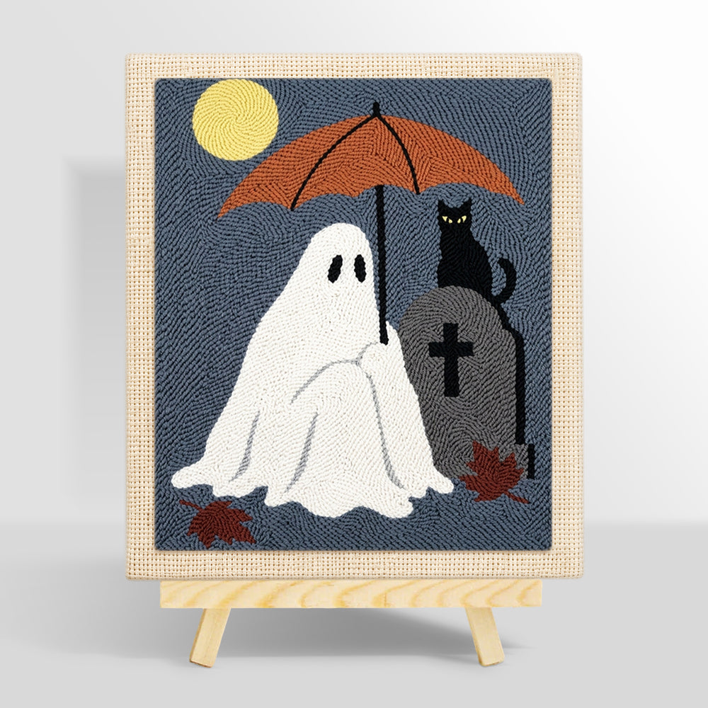 Ghost holding umbrella at graveyard punch needle kit for beginners