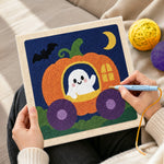 Creating handmade ghost in pumpkin carriage punch needle artwork