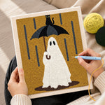 Creating handmade ghost in rain punch needle artwork