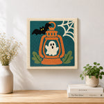 Finished ghost inside lantern artwork displayed on a wall