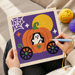 Creating handmade ghost inside pumpkin carriage punch needle artwork