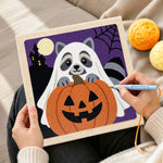 Creating handmade ghost raccoon and pumpkin punch needle artwork