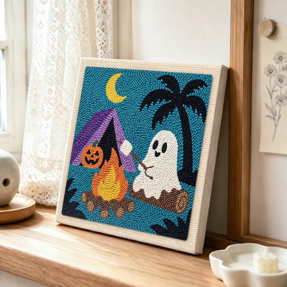 Ghost roasting marshmallows punch needle artwork displayed on a table