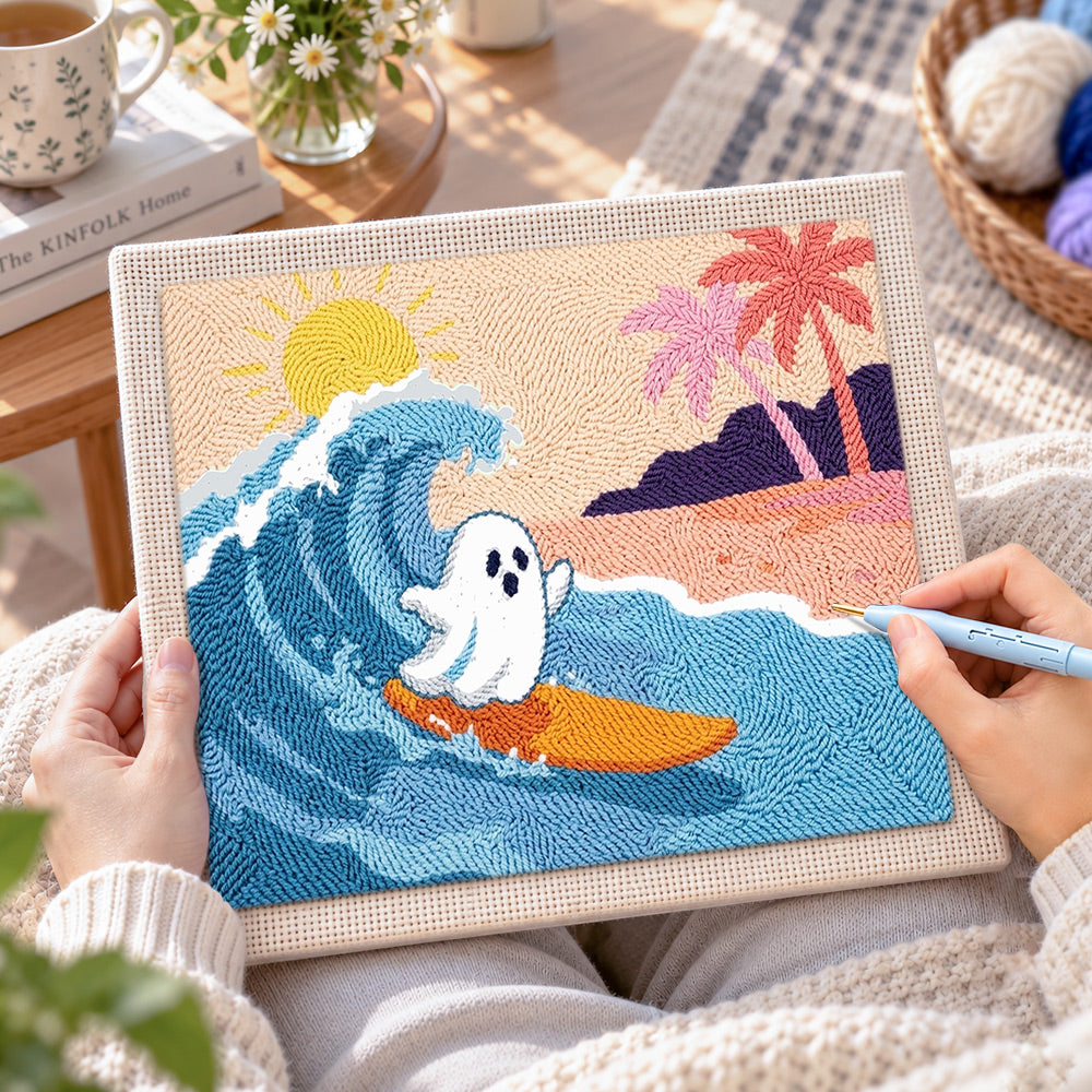 Creating handmade ghost surfing at beach punch needle artwork