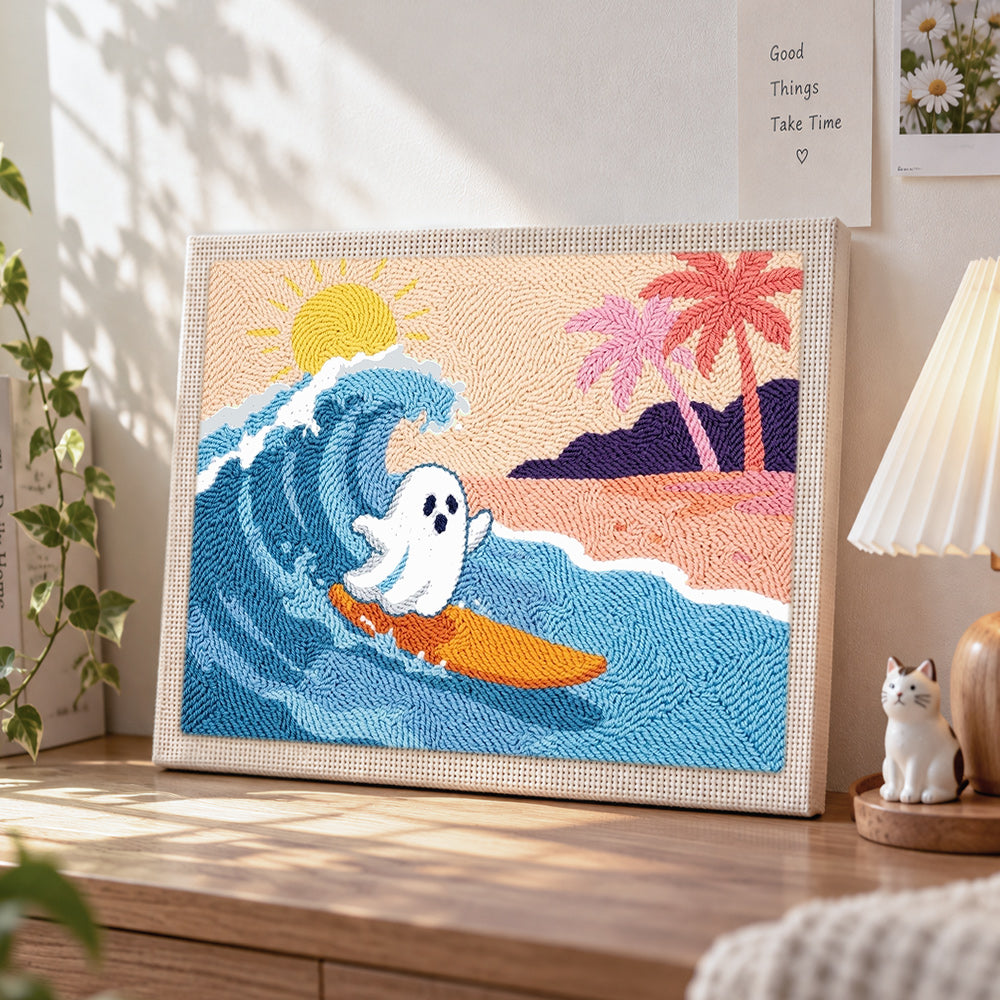Ghost surfing at beach punch needle artwork displayed on a table