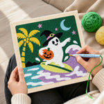 Creating handmade ghost surfing on waves punch needle artwork