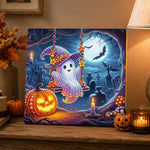 Finished ghost swinging in graveyard pearl diamond painting artwork displayed as holiday home decor