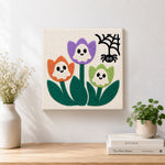 Finished ghost tulip blooms artwork displayed on a wall