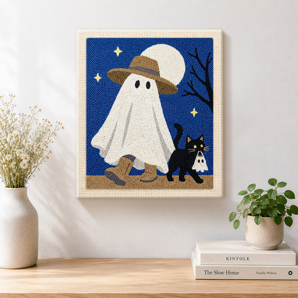 Finished ghost walking with cat artwork displayed on a wall