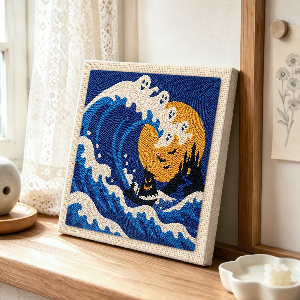 Ghost wave ocean scene punch needle artwork displayed on a table
