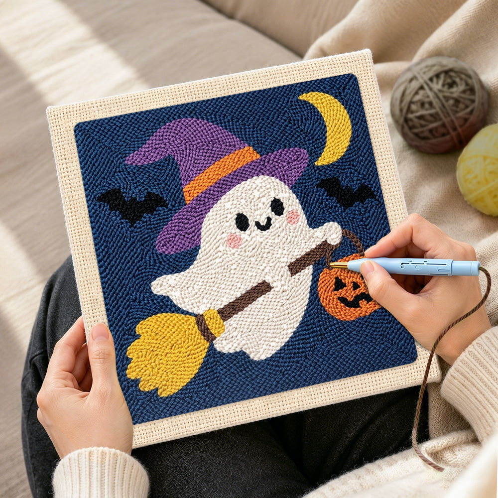 Creating handmade ghost witch on broom punch needle artwork
