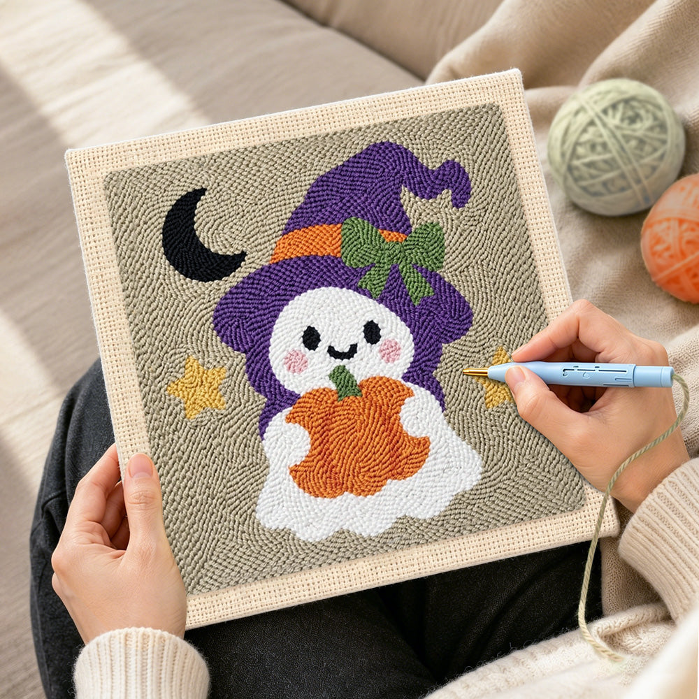 Creating handmade ghost witch with pumpkin lantern punch needle artwork