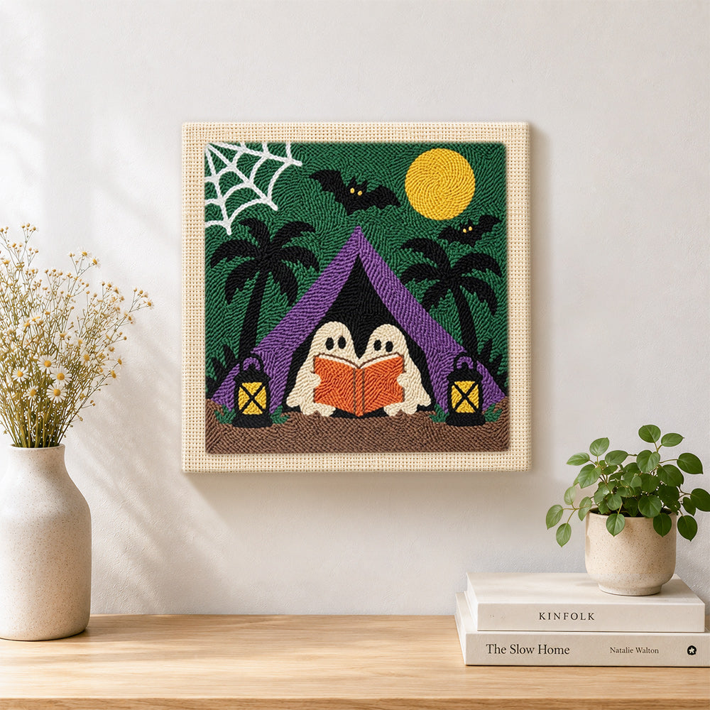 Finished ghosts camping reading artwork displayed on a wall