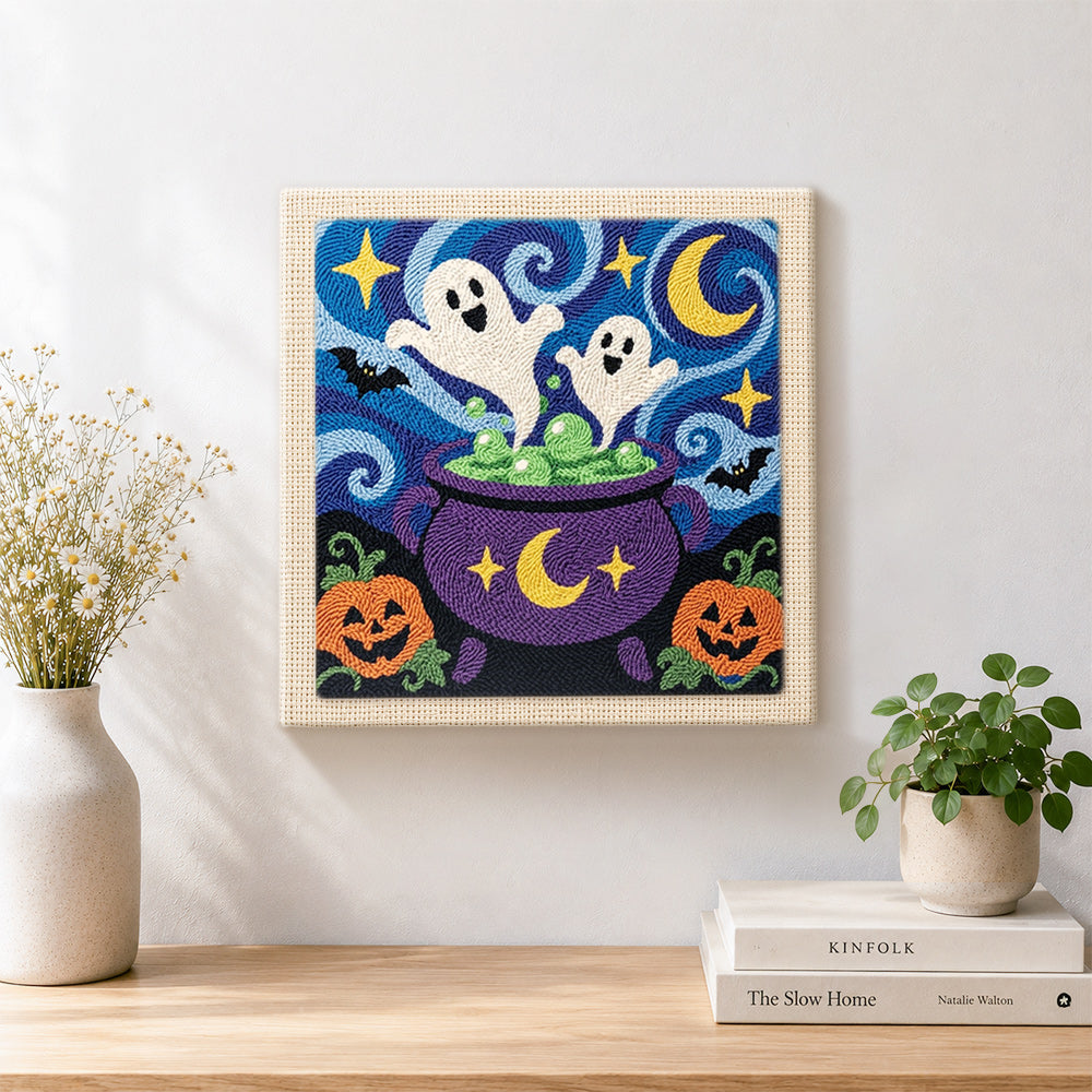 Finished ghosts in magic cauldron artwork displayed on a wall