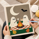 Creating handmade ghosts toasting marshmallows punch needle artwork
