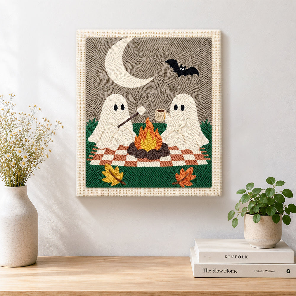 Finished ghosts toasting marshmallows artwork displayed on a wall