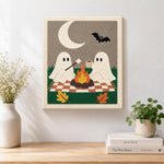 Finished ghosts toasting marshmallows artwork displayed on a wall
