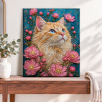 Finished ginger cat with pink blooms pearl diamond painting artwork displayed as home decor