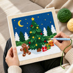 Creating handmade gingerbread man and christmas tree punch needle artwork