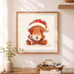 Finished gingerbread man hot cocoa cross stitch artwork displayed as home decor