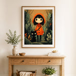 Finished girl and black cat cross stitch artwork displayed as home decor