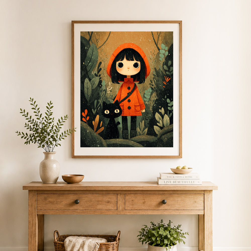 Finished girl and black cat cross stitch artwork displayed as home decor