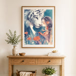Finished girl and white tiger cross stitch artwork displayed as home decor