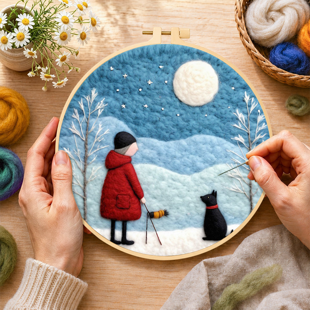 Creating the girl in red coat walking black dog wool painting by hand with a felting needle