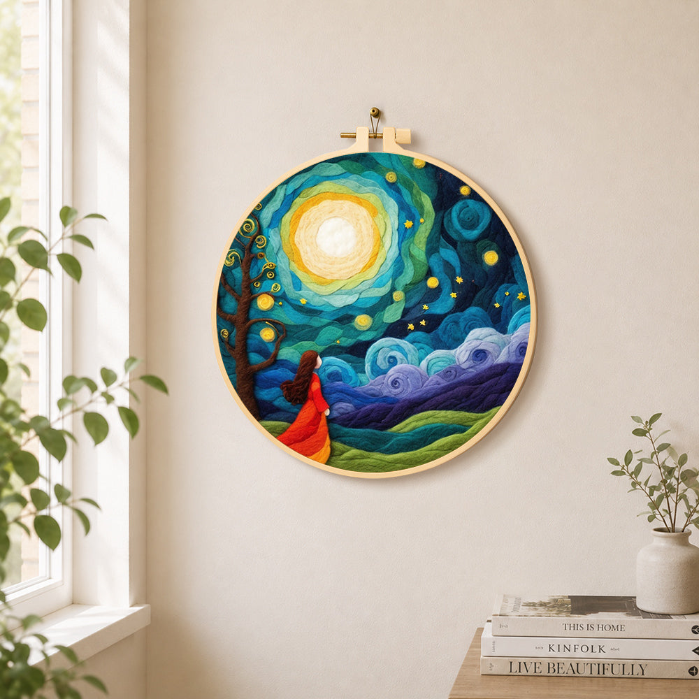 Girl in red dress under swirling starry night needle felt wall art displayed in a bright home interior