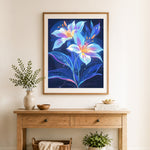 Finished glowing blue lilies cross stitch artwork displayed as home decor