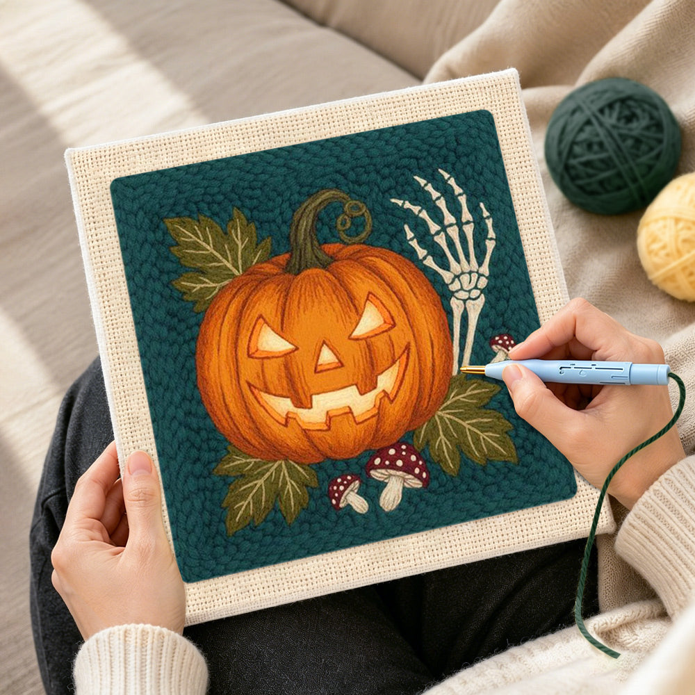 Creating handmade glowing jack o lantern punch needle artwork