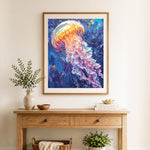Finished glowing jellyfish cross stitch artwork displayed as home decor