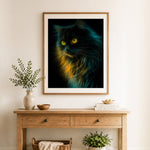 Finished glowing mystic black cat cross stitch artwork displayed as home decor