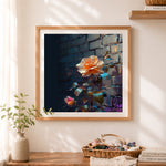 Finished glowing orange rose cross stitch artwork displayed as home decor
