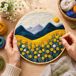 Creating the golden flower field and snowy peaks wool painting by hand with a felting needle