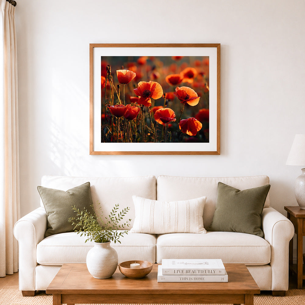 Finished golden hour poppy field cross stitch artwork displayed as home decor